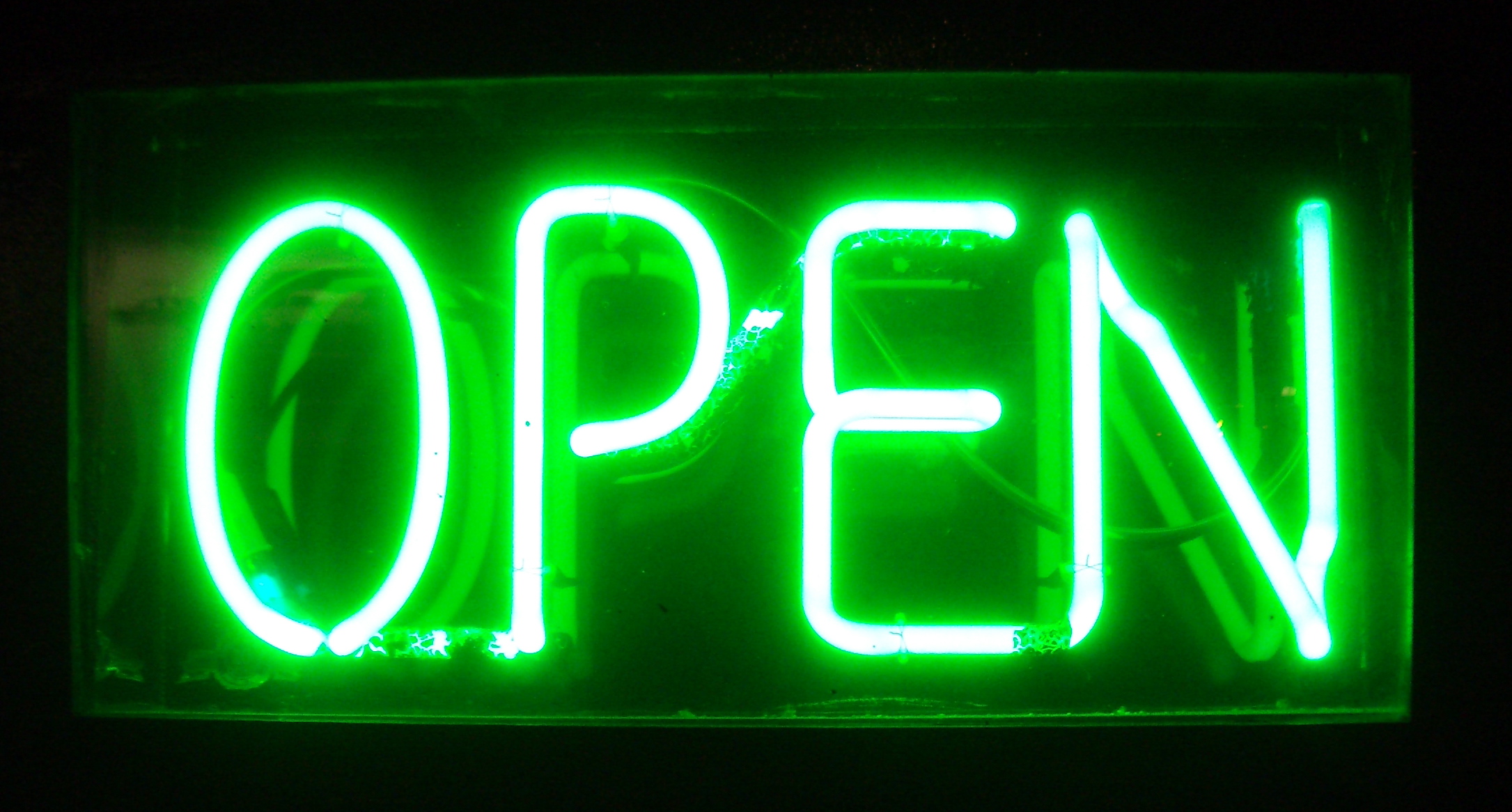 open sign neon business lighthouse owners observer